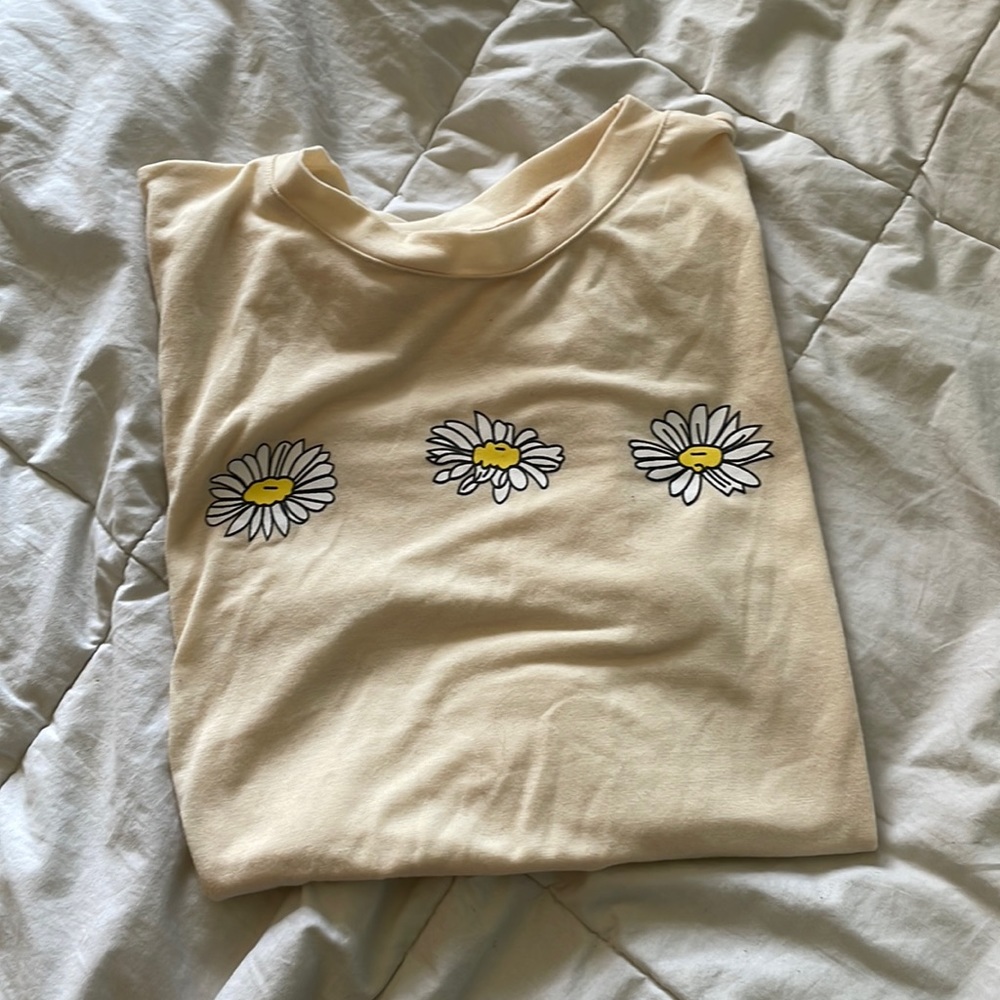 Beige shirt with daisies